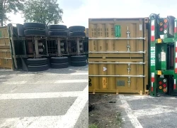 Xe đầu kéo container lật nhào khi ôm cua lên cầu vượt cửa ngõ TPHCM