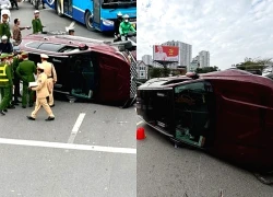 Ô tô Santa Fe lật nghiêng giữa đường ở Hà Nội