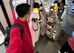 Cảnh nam sinh ngồi bấm điện thoại khi bà bầu đứng suốt 30 phút trên tàu metro số 1 gây tranh cãi dữ dội