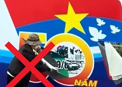Công an vào cuộc vụ người phụ nữ cầm dao rạch biển pa nô chào mừng