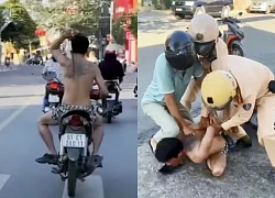 CSGT khống chế người đàn ông vừa lái xe vừa "múa rựa"