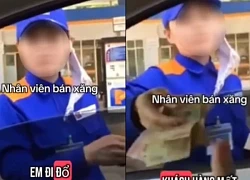 Clip nhân viên cây xăng phải tự mở nắp bình cho khách gây tranh cãi: "Mất tiền mua xăng, sao phải nhờ hả chị?"
