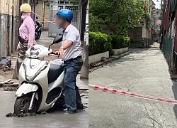 Xôn xao clip người đàn ông đi xe máy 'cày' rãnh dài trên đường mới đổ bê tông ở Hà Nội