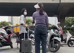 Người bán trà đá đuổi cô gái đứng ở vỉa hè bến xe Mỹ Đình