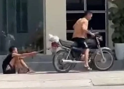 Phẫn nộ hình ảnh bé trai bị bố xích chân kéo lê trên đường phố Hải Phòng