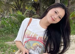 Bạn gái Nhâm Mạnh Dũng khoe vòng 3 tròn trịa trên bờ biển