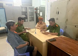 Công an mời làm việc người phun sơn dòng chữ 'bắn tốc độ' trên đường ở TPHCM