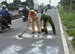 Truy tìm người sơn chữ "bắn tốc độ" trên đường ở TPHCM