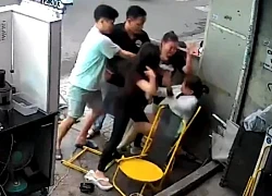 Người phụ nữ bị nhóm người đánh hội đồng trước nhà
