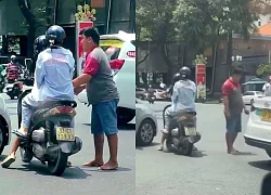 Đưa tài xế xe công nghệ rút chìa khóa xe máy của cô gái ở hồ Con Rùa về trụ sở làm việc