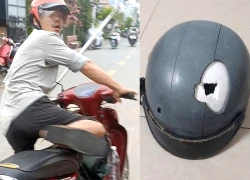 Người đàn ông bị đánh thủng nón bảo hiểm khi đi trên đường ở TPHCM