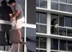 Người phụ nữ gây sốc khi đứng lau cửa sổ ở tầng 16