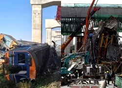 Cần cẩu sập xuống đoàn tàu ở Thái Lan, ít nhất 22 người chết