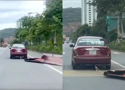 Xác minh ô tô kéo lê khung sắt, tấm tôn trên đường ở Quảng Ninh