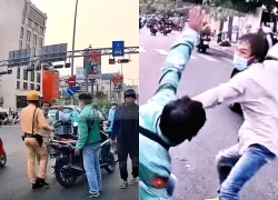 Tạm giam 2 người cầm nón bảo hiểm đánh nhau trên đường ở TPHCM