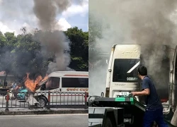 Ô tô 16 chỗ bốc cháy trên bàn nâng xe cứu hộ ở TPHCM