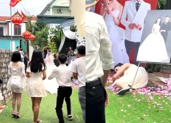 Tranh bắt hoa cưới, cô gái bị 2 thanh niên xô ngã lăn ra đất