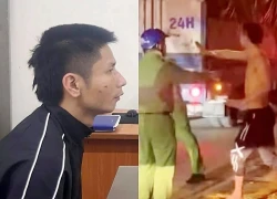 Tạm giữ đối tượng cầm 2 dao chém người đi đường, đấm công an ở Hà Nội