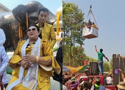 Hỗn loạn cảnh 2 ca sĩ dùng cần cẩu rải tiền cho 500 người sau khi trúng số độc đắc