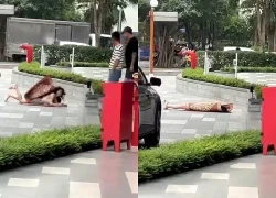 Clip hot girl có hành động khó hiểu, nằm đắp chiếu giữa sảnh chung cư đông người