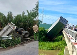 Xe tải cắm đầu xuống kênh sau cú tông thành cầu, tài xế nguy kịch