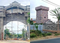 Bị xử phạt, hộ dân vẫn cố xây cổng hoành tráng lấn hành lang quốc lộ