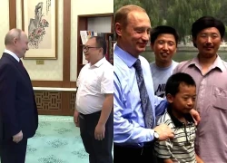 Tổng thống Putin hội ngộ cậu bé Trung Quốc từng chụp ảnh cùng 26 năm trước
