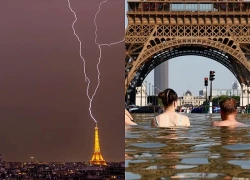 Cảnh tượng hiếm thấy sét đánh trúng tháp Eiffel sau ngày nắng kỷ lục