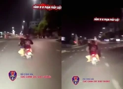 Thiếu nữ 15 tuổi chạy xe máy 'kẹp ba', đánh võng rồi tông vào dải phân cách