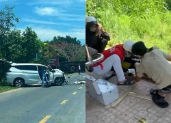 Xe đầu kéo lật ngang quốc lộ sau va chạm ô tô, 3 người bị thương