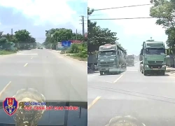 Ô tô đầu kéo ở Hà Nội vượt ẩu khiến tài xế xe ngược chiều 'đứng hình'