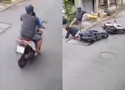 Người đàn ông đạp vào đầu cô gái sau va chạm giao thông