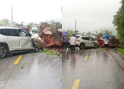 Ô tô bị tảng đá nặng cả chục tấn rơi trúng trên quốc lộ, đầu xe bẹp dúm