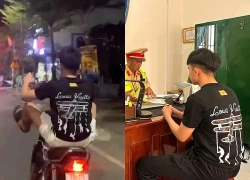 Con lái xe máy bằng chân, bố bị xử phạt