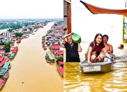 Nước lũ bao vây khu dân cư, người Bắc Ninh phải dùng thuyền đi lại