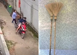 Người phụ nữ liên tục thách thức, dùng chổi đánh hàng xóm