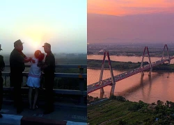 Cảnh sát ngăn người mẹ bế con có ý định tự tử ở cầu Nhật Tân